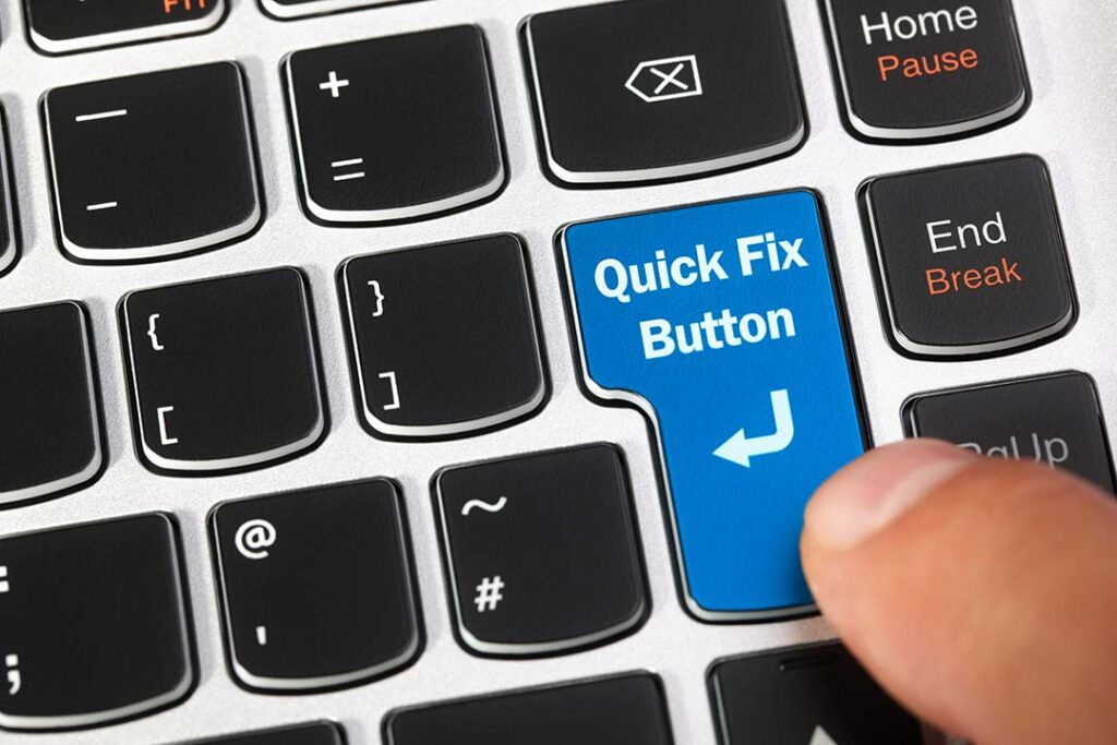 Computer keyboard enter key with a magic quick fix button concept for AI quick fix help with Marketing, Sales, IT support, technical assistance and customer service